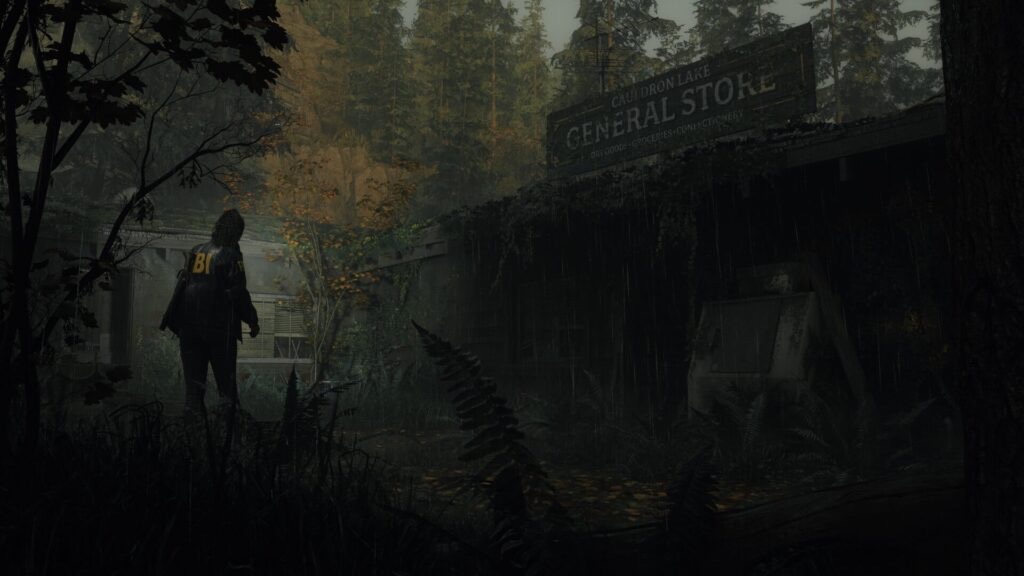 Atmospheric forest scene from Alan Wake 2 featuring an FBI agent near an abandoned building.
